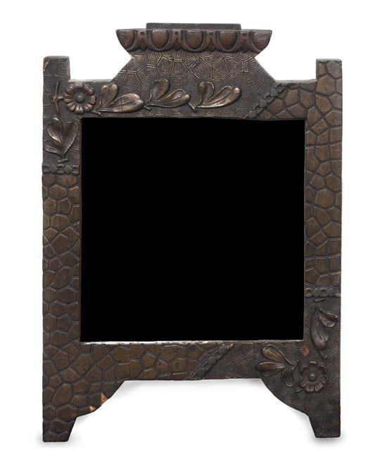 A Carved Wood Mirror having
