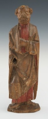 A Carved Wood Santos Figure Ma