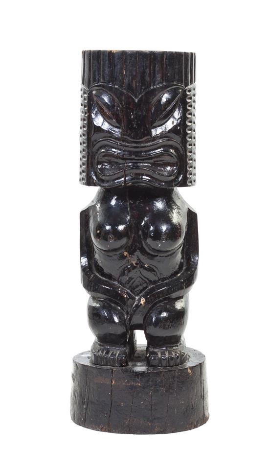 A Carved Wood Tiki Jardiniere