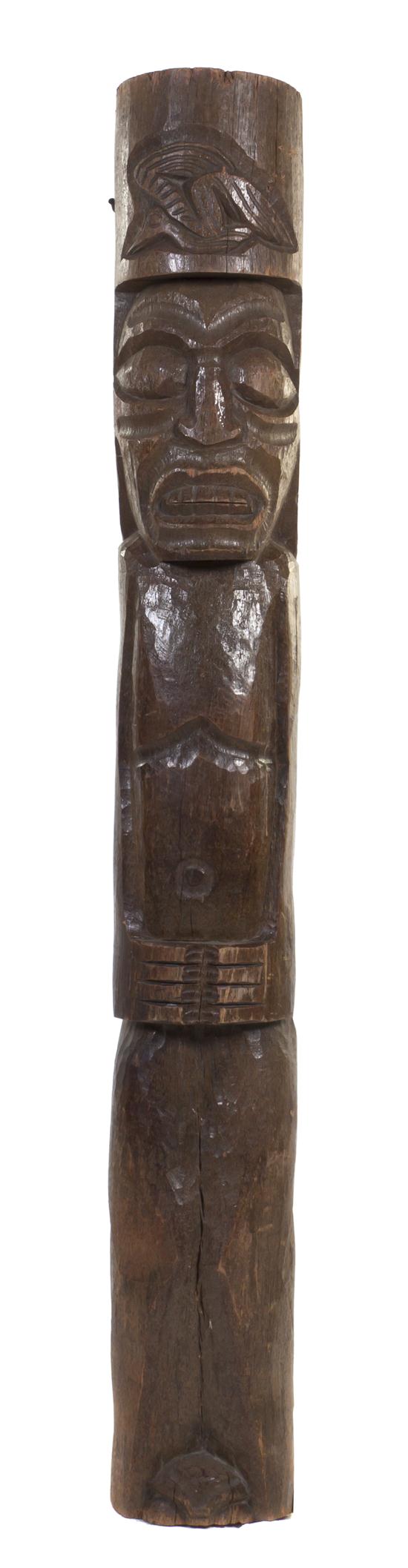 A Carved Wood Tiki Totem of