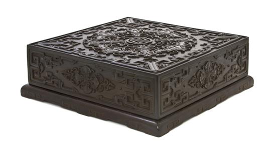 A Carved Zitan Lidded Box with Jade