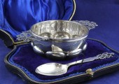 A cased Edwardian silver quaic