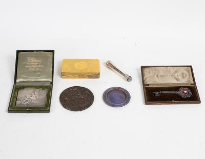 A cased key, cased plaque and
