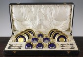 A cased Limoges porcelain coff