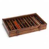 A CASED SET OF (13) WRITING IN