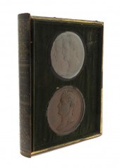 *A Cased Set of Bronzed Lead M