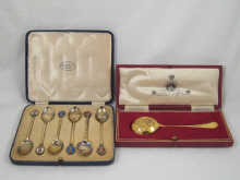 A cased set of six enamelled silver