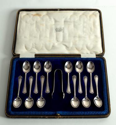A cased set of twelve silver