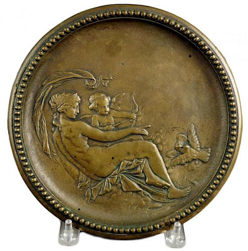 A CAST BRASS PLAQUE DEPICTING VENUS