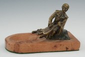 A Cast Bronze Figure of Seated
