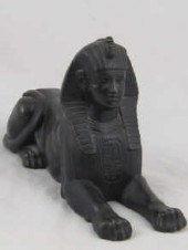 A cast bronze model of sphynx.