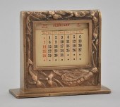 A Cast Bronze Perpetual Deskto