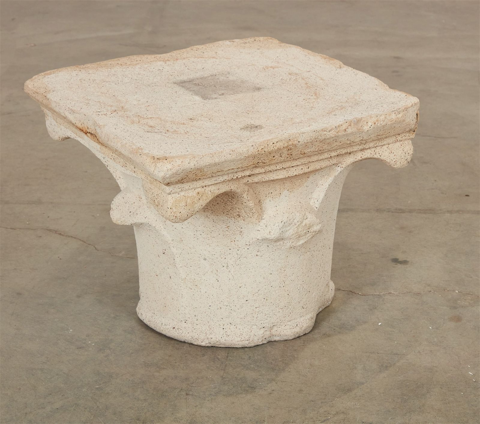 A CAST COMPOSITION FAUX STONE