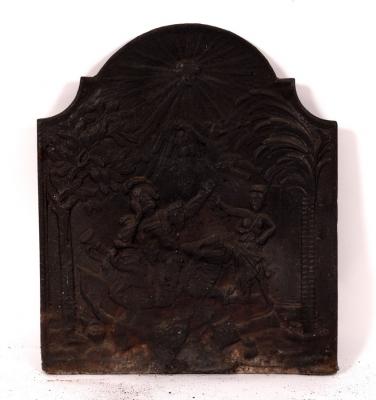 A cast iron arch-top fire back,