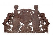 A CAST IRON ARMORIAL ARCHITECT