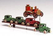 A CAST IRON CAR CARRIER WITH V