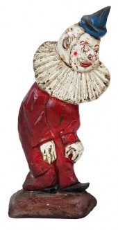 A CAST IRON CLOWN DOORSTOPearl