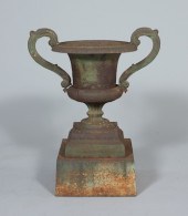 A Cast Iron Garden Urn By Walb