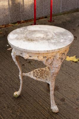 A cast iron public house table on