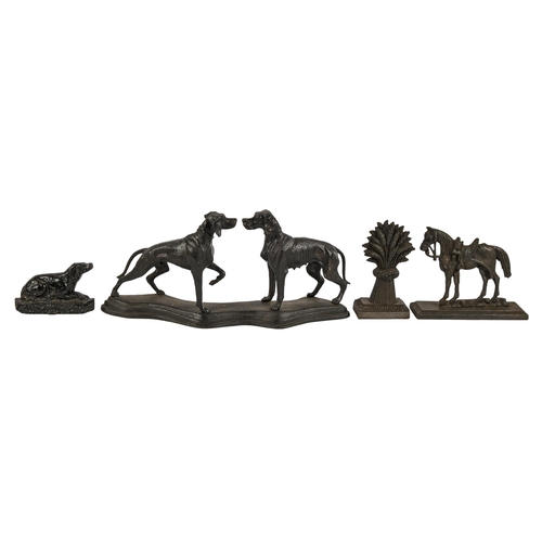 A cast iron sculpture of a dog