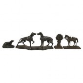 A cast iron sculpture of a dog