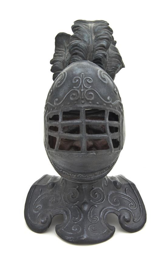 A Cast Metal Figural Inkwell in the