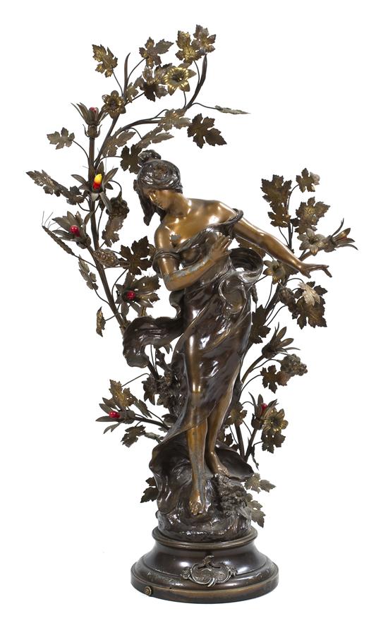 A Cast Metal Figural Newel Post