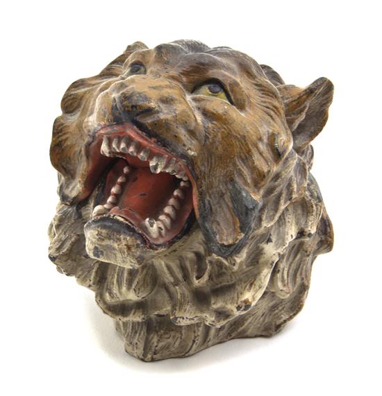 A Cast Metal Inkwell in the form of