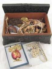 A cast metal Japanese jeweller