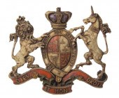 A Cast Plaster Armorial Overdo