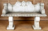 A CAST STONE GARDEN BENCH RAIS