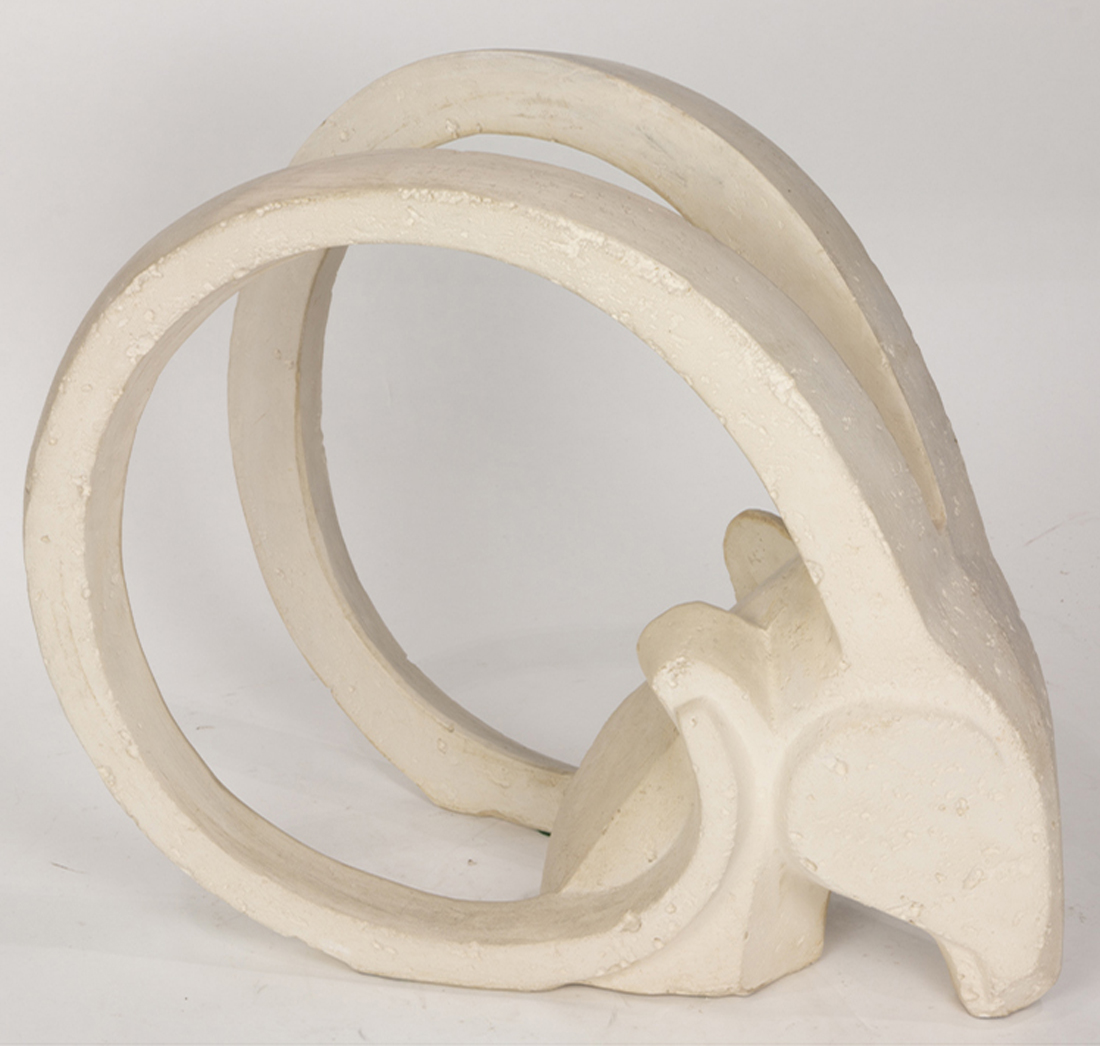 A CAST STONE HEAD OF A GAZELLE A