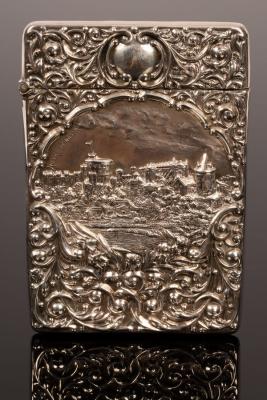 A castle top embossed silver