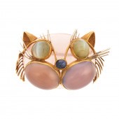 A CAT PIN WITH CHRYSOBERYL EYE