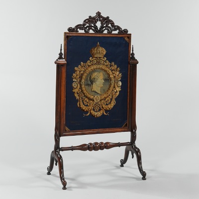 A Caved Mahogany Fire Screen