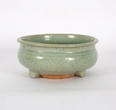A celadon glaze censer, incised, on