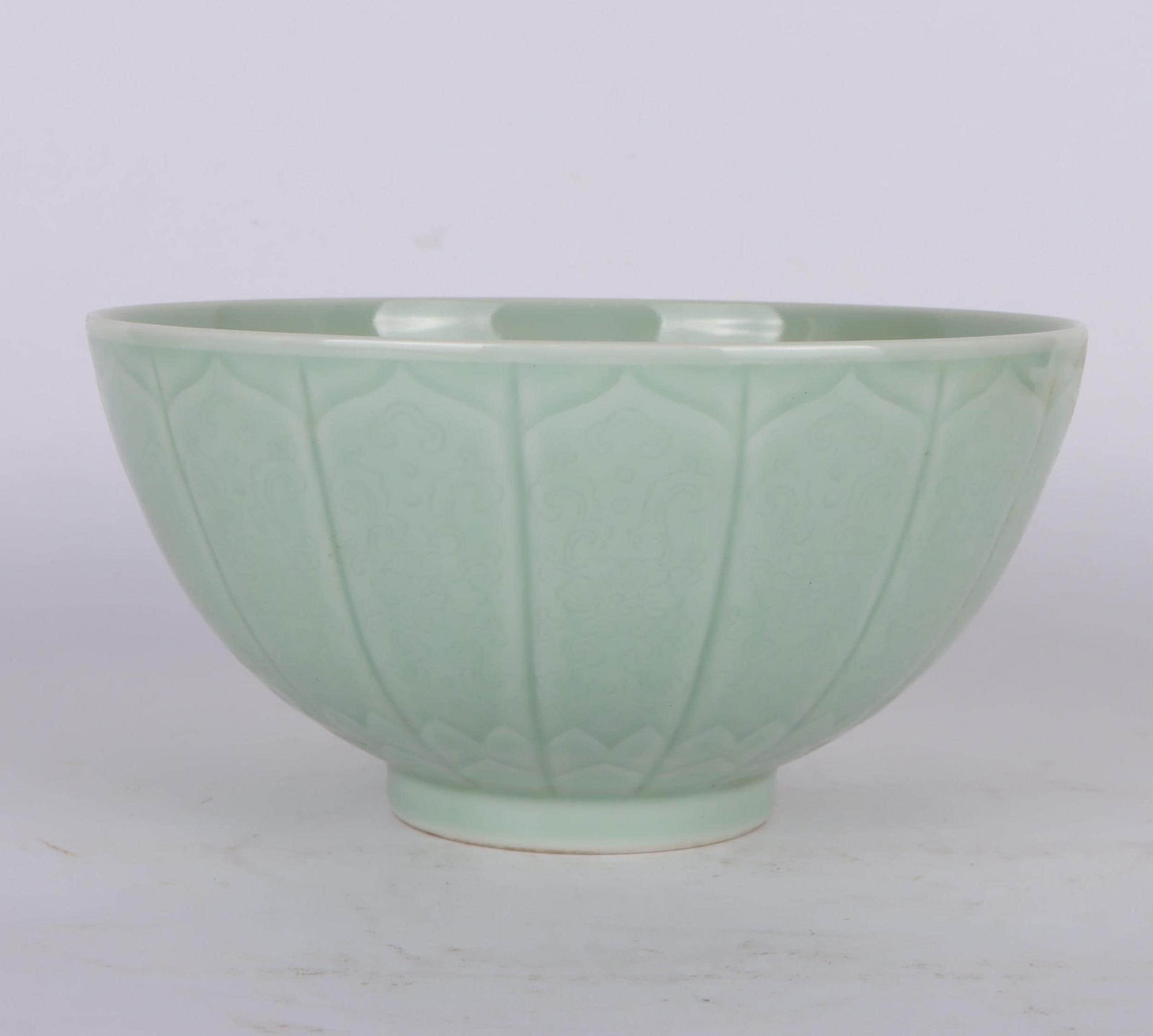 A CELADON-GLAZED MELON SHAPED BOWLA