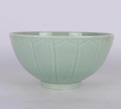 A CELADON-GLAZED MELON SHAPED