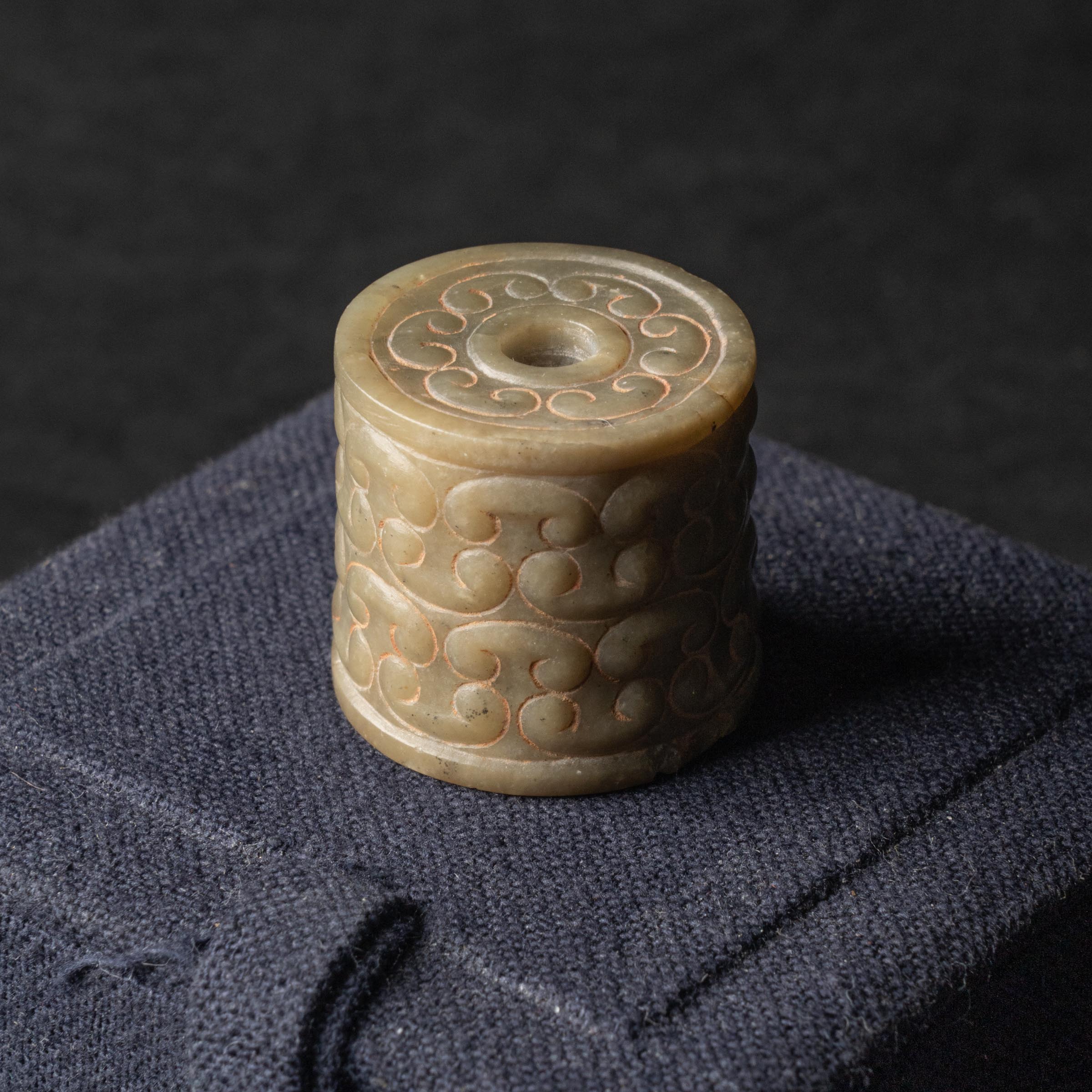 A Celadon Jade Tubular Pendant,