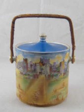 A ceramic biscuit barrel with