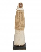 A CERAMIC, BRONZE, AND FIBER F