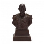 A CERAMIC BUST OF A JAPANESE E