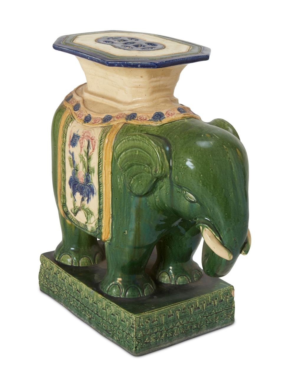 A CERAMIC ELEPHANT SIDE TABLEA