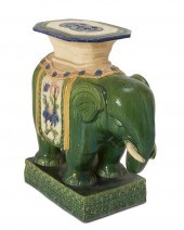 A CERAMIC ELEPHANT SIDE TABLEA