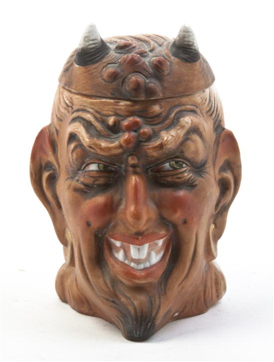 * A Ceramic Figural Tobacco Jar