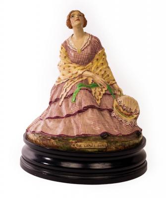 A ceramic figure entitled 'The