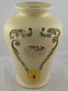A ceramic vase with raised