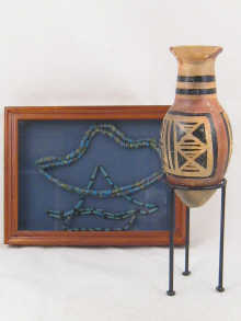 A ceramic wine bottle believed