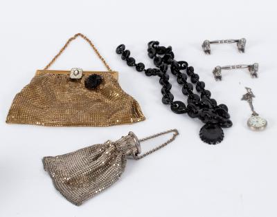 A chain mail type miser's purse,