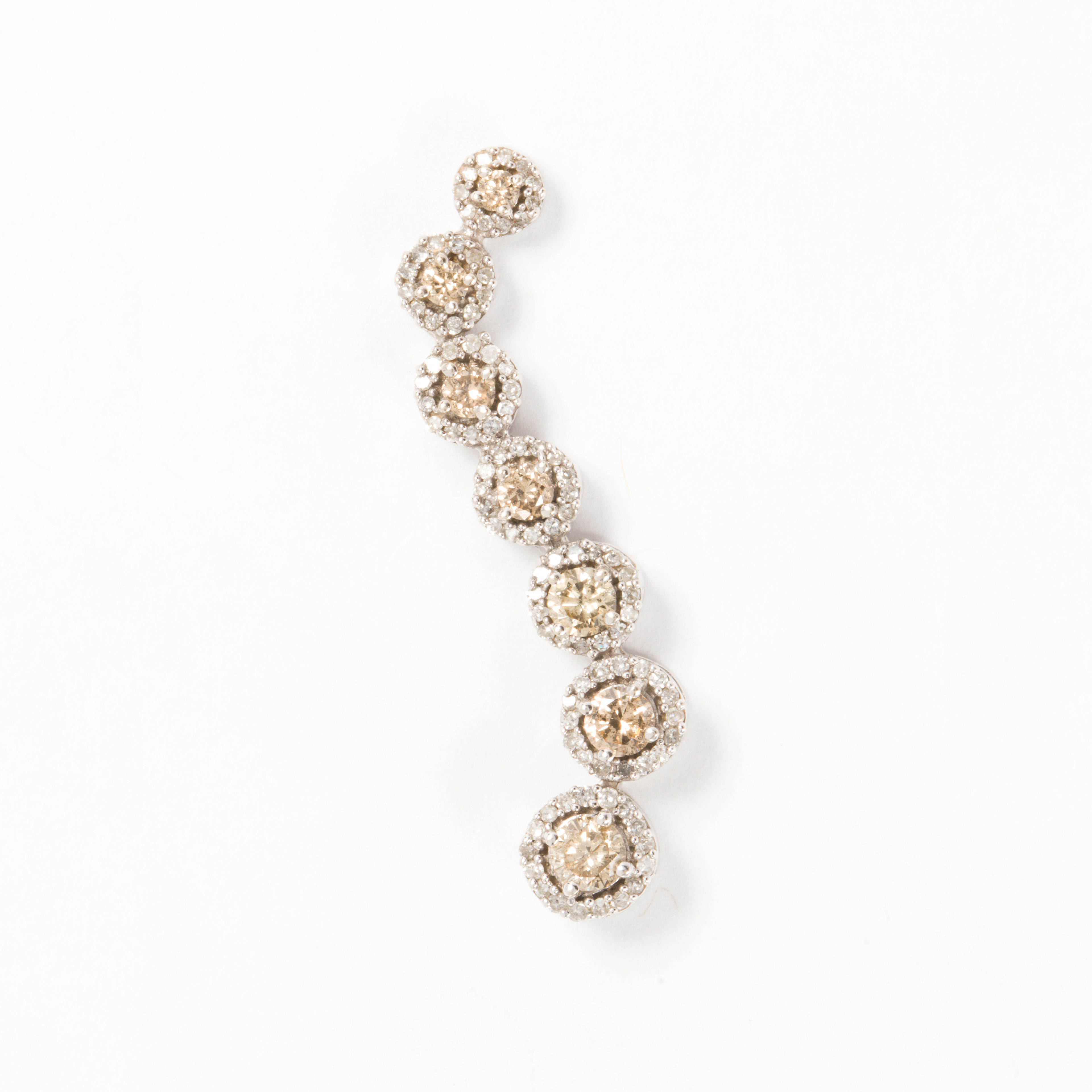 A CHAMPAGNE DIAMOND AND TEN KARAT